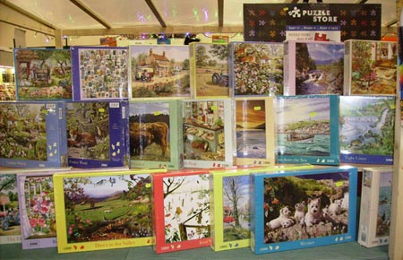 Selection of jigsaws at our shop in Chester Market